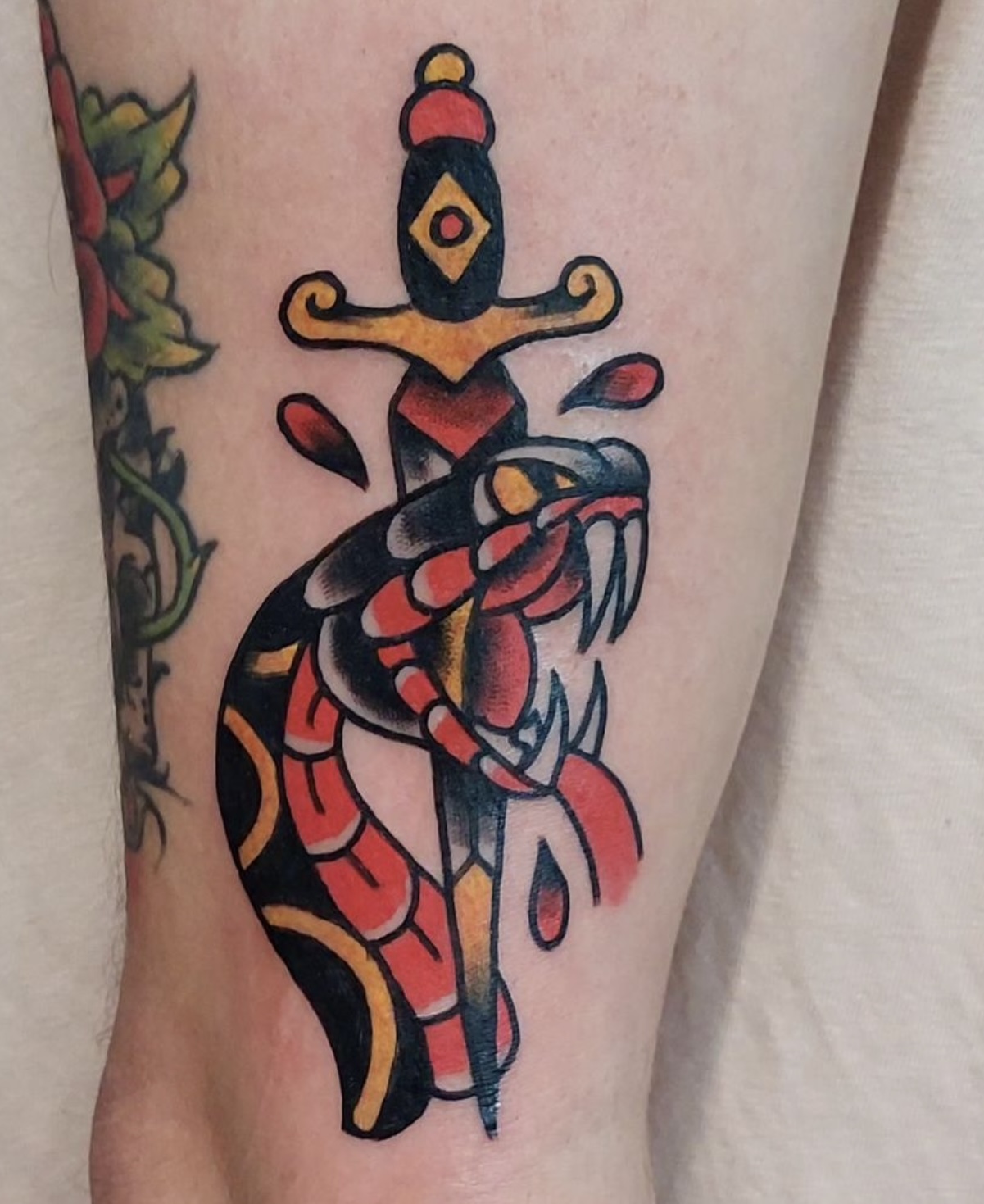 neo traditional tattoo knife snake by vatican lounge in manchester uk