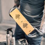 This image features a dynamic spades tattoo designed and executed by Vatican Lounge in Manchester, UK. The tattoo is known for its intricate detailing and unique design elements.